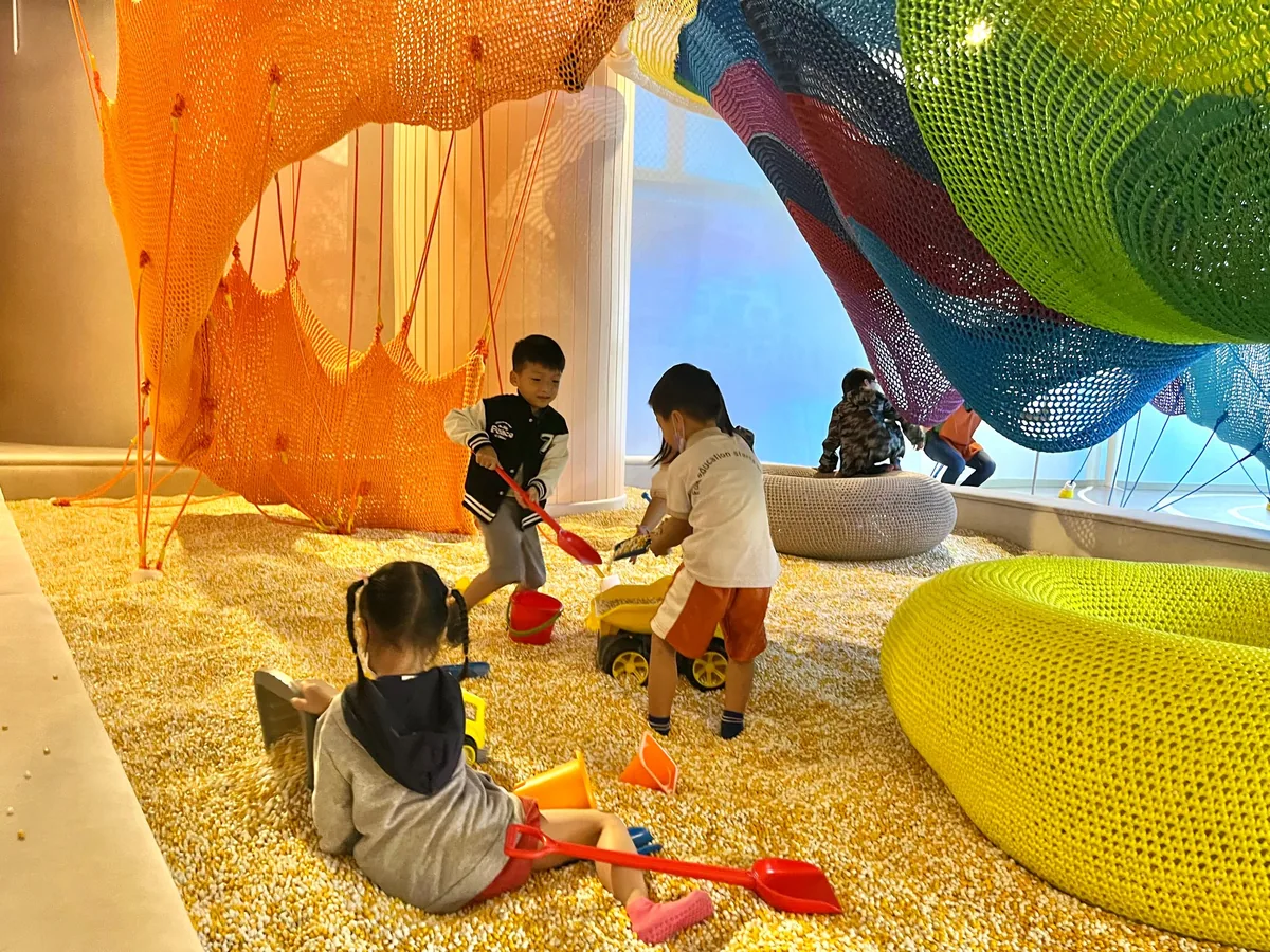 Children exploring the soft net-and-sand adventure course at UFOREA Penang