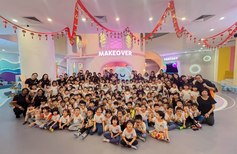 A large school group visit photo inside UFOREA Penang
