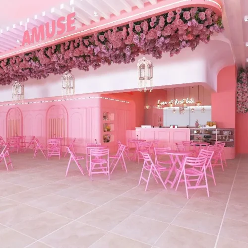 Amuse Café by UFOREA The rose-covered pink Amuse Café beside the UFOREA entrance