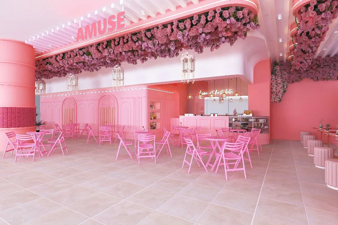 Amuse Café by UFOREA The rose-covered pink Amuse Café beside the UFOREA entrance
